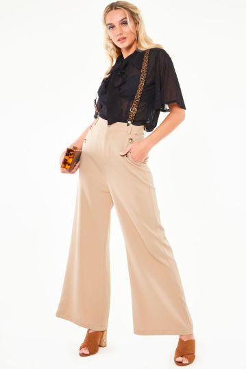 Safari flare trousers with leopard print suspenders