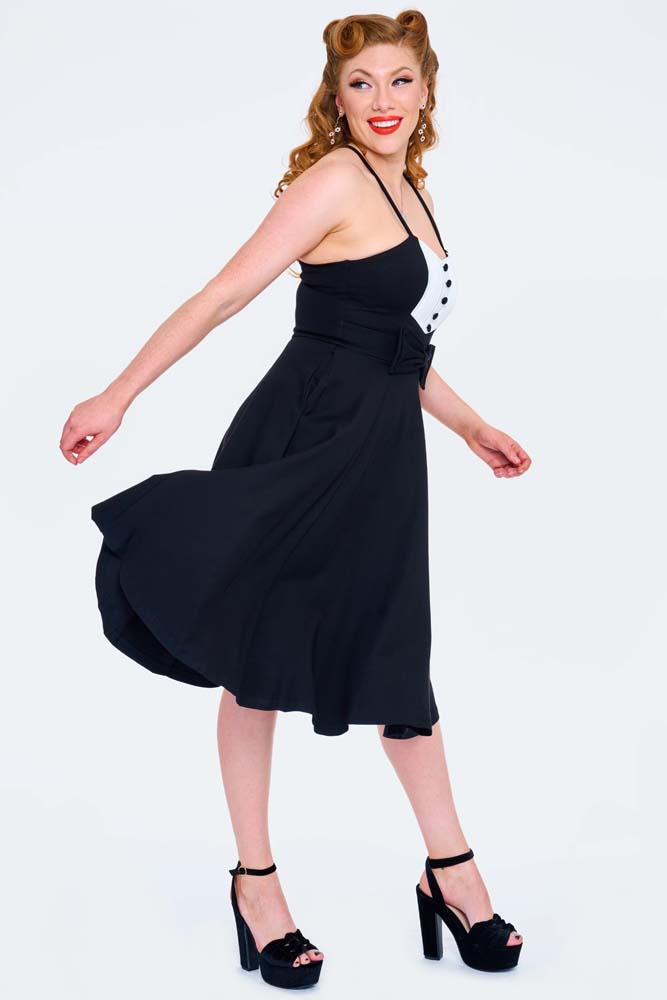 Hessy Knit Flare dress with contrast pleated panel and bow detail